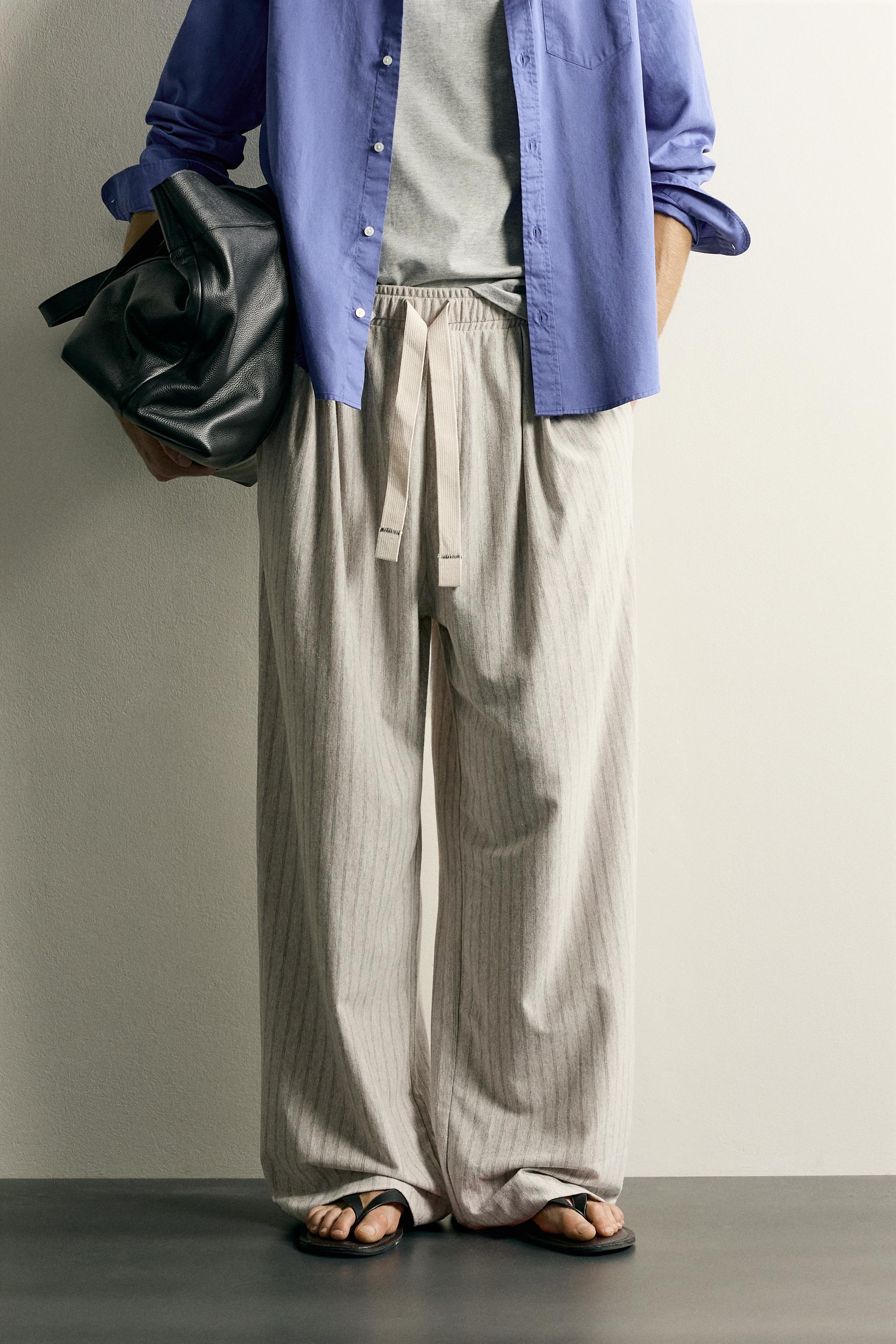 STRIPED RELAXED FIT PANTS